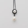 Pearl and sterling silver pendant