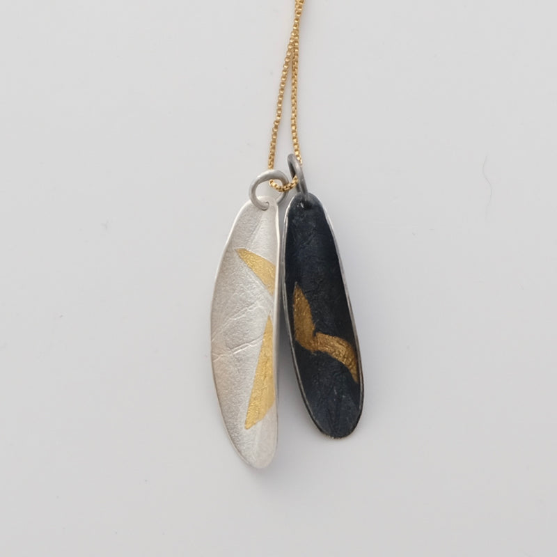 Sterling silver and gold pendant
